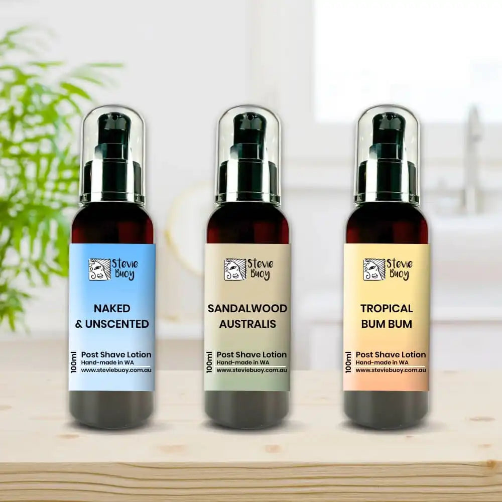 Three post-shave lotion bottles with different scent varieties from the Mine Dog brand.